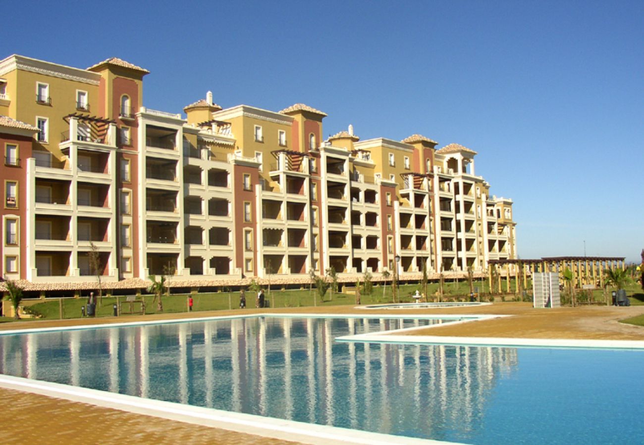 Apartamento en Isla Canela - Apartamento con piscina a 100 m de la playa