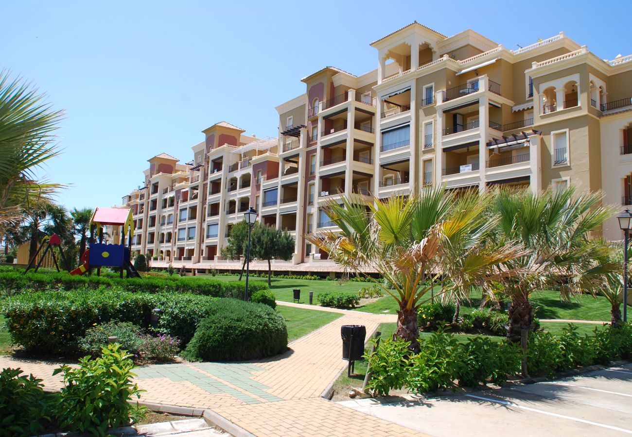 Apartamento en Isla Canela - Apartamento con piscina a 100 m de la playa