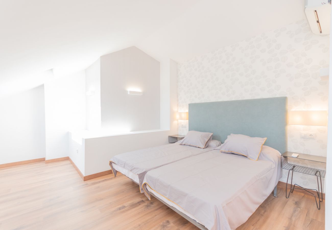 Dormitorio de este apartamento en el centro de Málaga